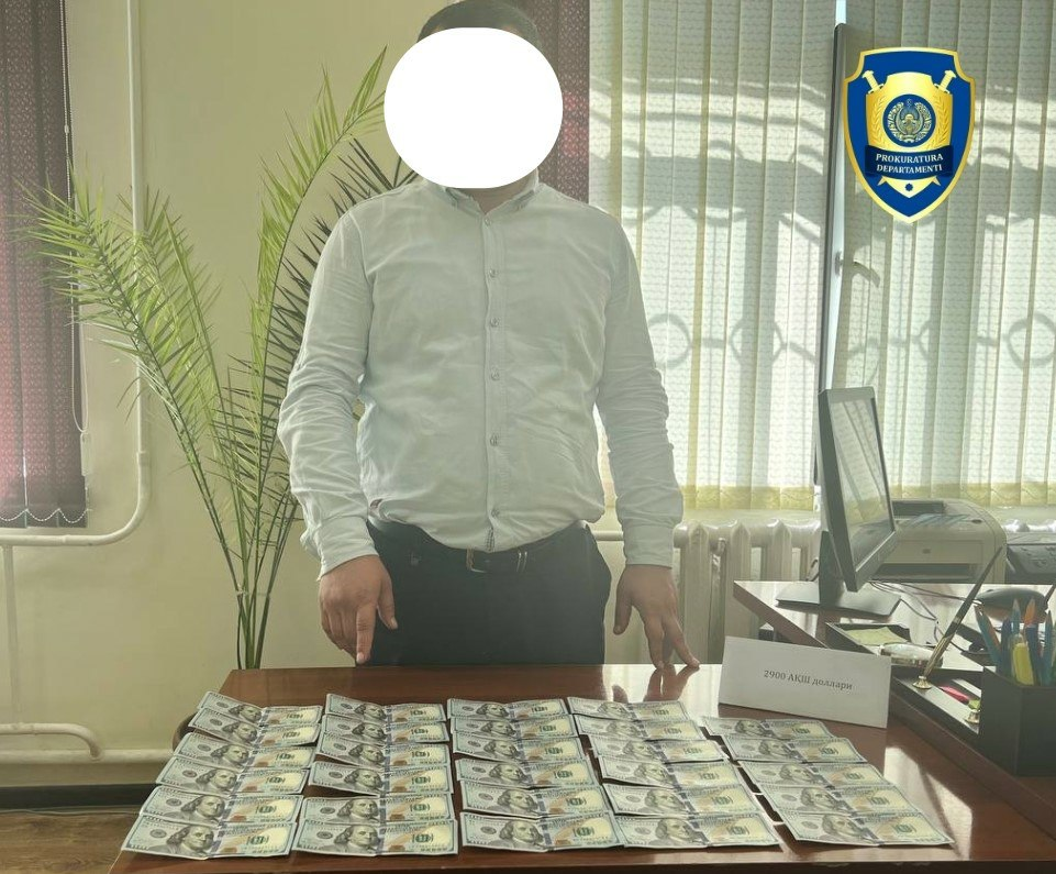 Урганч туманида фермердан пул ундирмоқчи бўлган бош мутахассис ушланди.